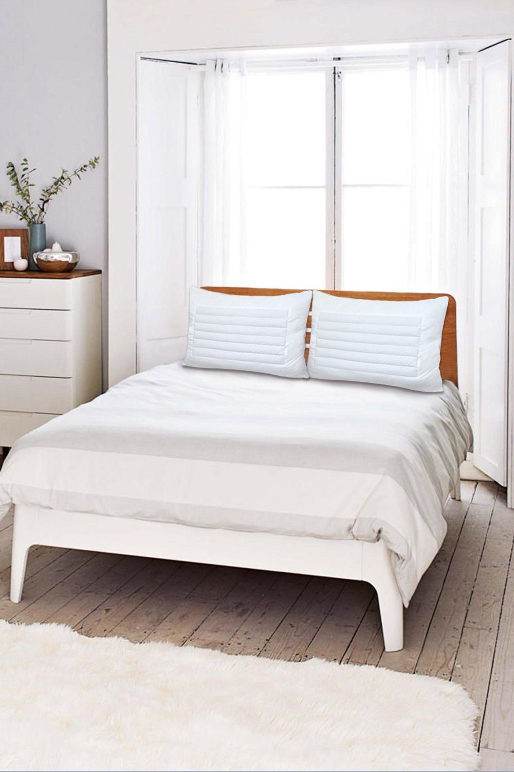 Подушка Модуль. Размер: 50*70 см. Чехол: тик.Напол.:хол-р, лузга - белый